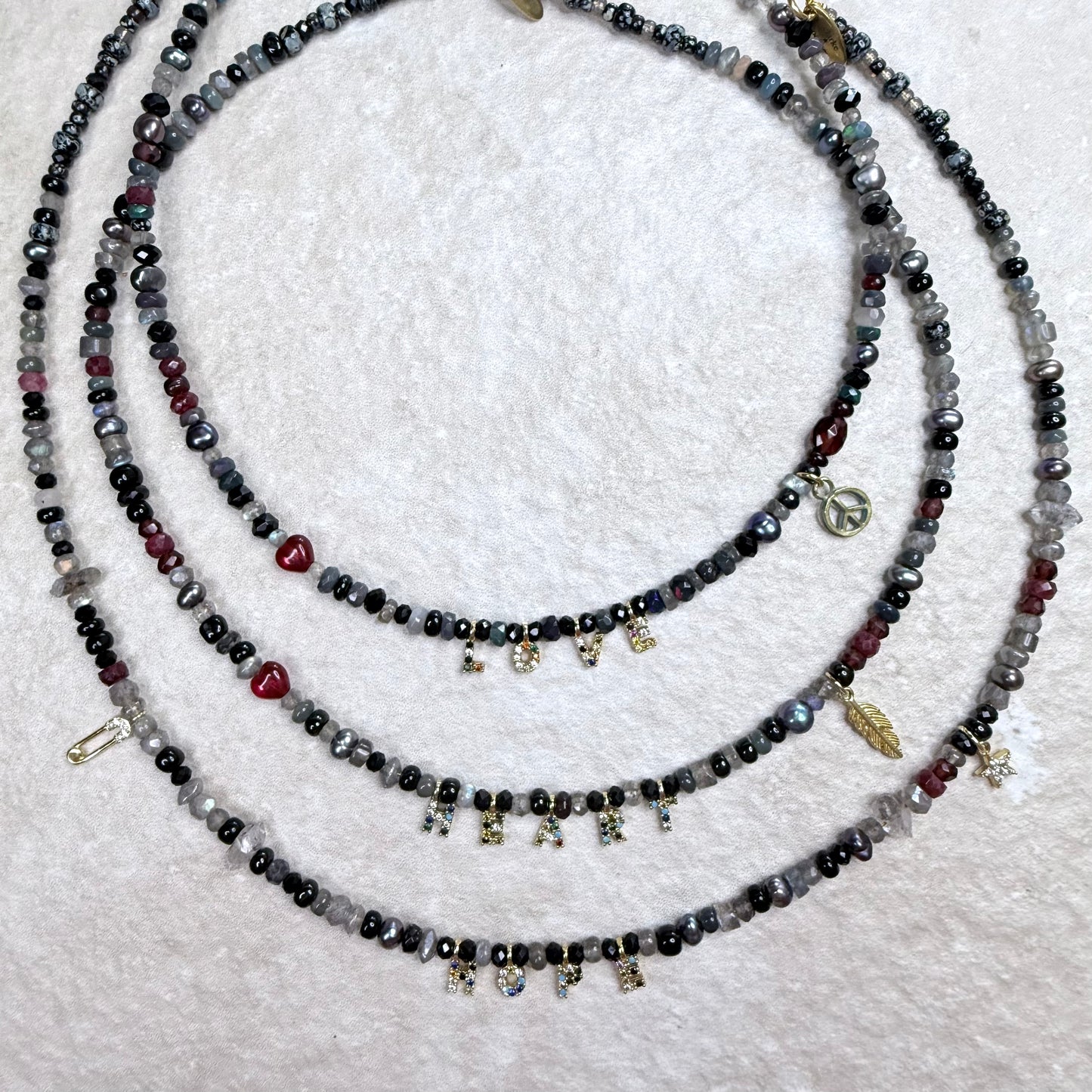 Chain of Hope ‘Wear Your Heart’ Heart/Hope Necklace | Ruby, Garnet & Mixed Gemstone Necklace | Handmade Jewellery | CLARKE PALMER