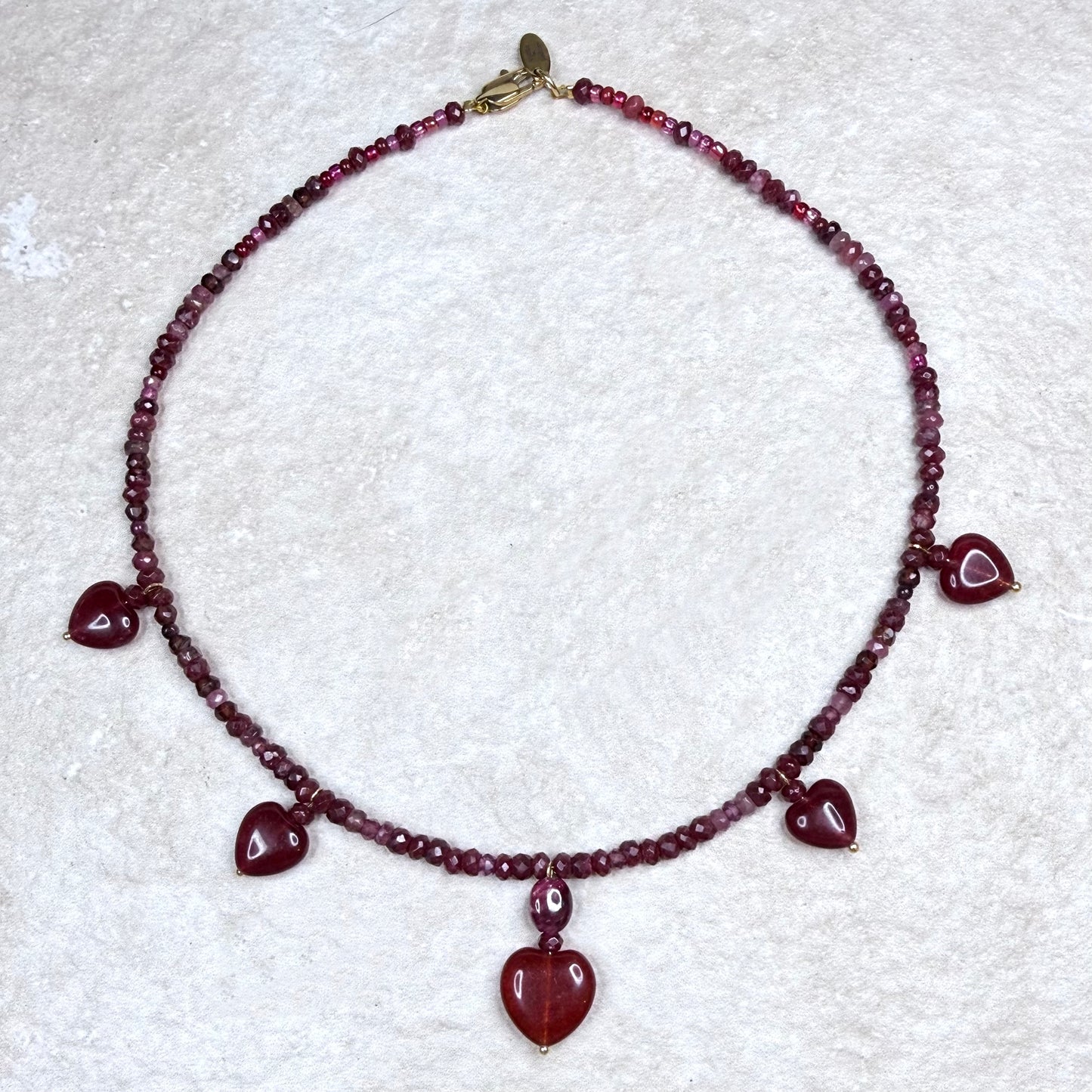 Chain of Hope ‘Wear Your Heart’ Courage Heart Necklace | Ruby, Garnet & Pink Tourmaline Necklace | Handmade Gemstone Jewellery | CLARKE PALMER