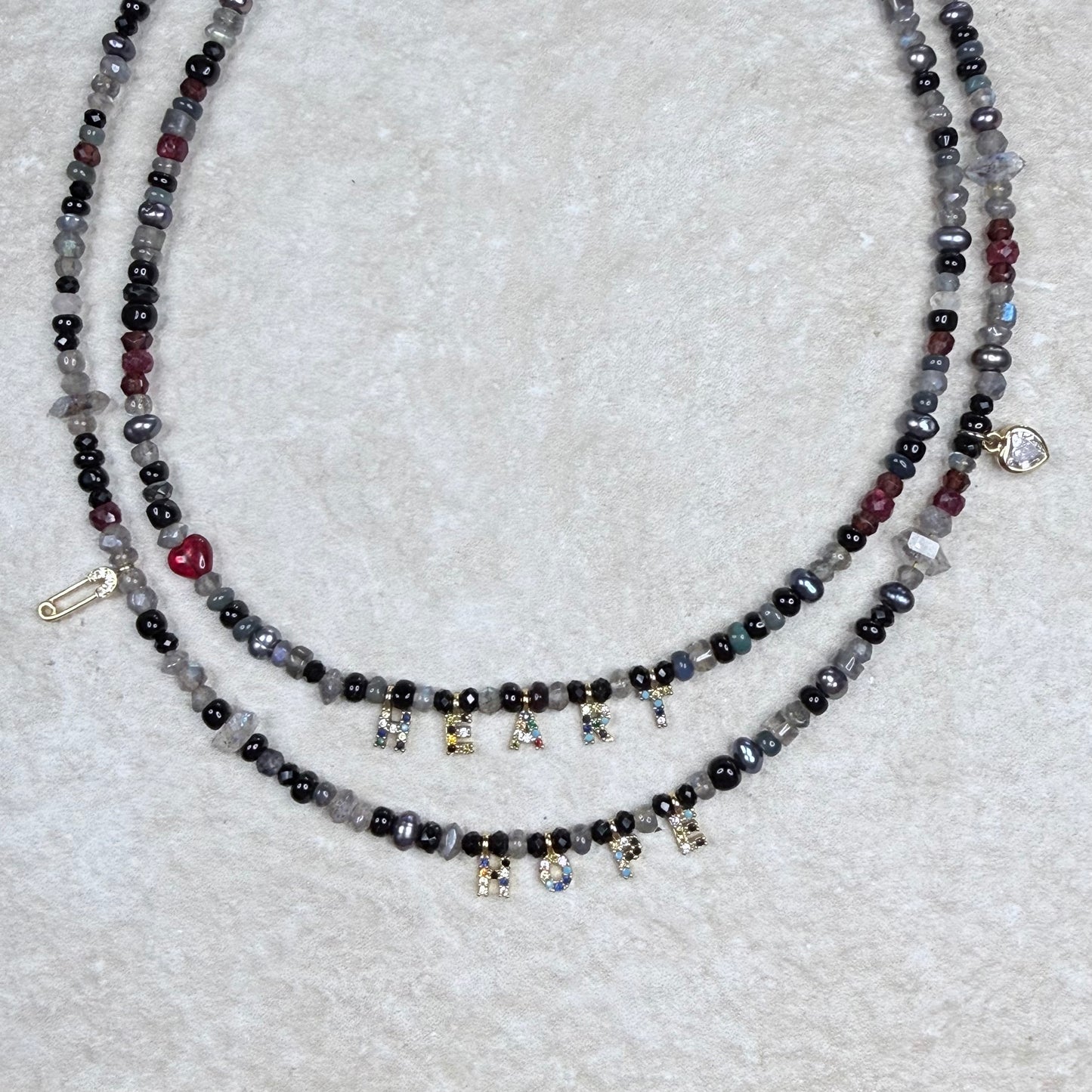 Chain of Hope ‘Wear Your Heart’ Heart/Hope Necklace | Ruby, Garnet & Mixed Gemstone Necklace | Handmade Jewellery | CLARKE PALMER