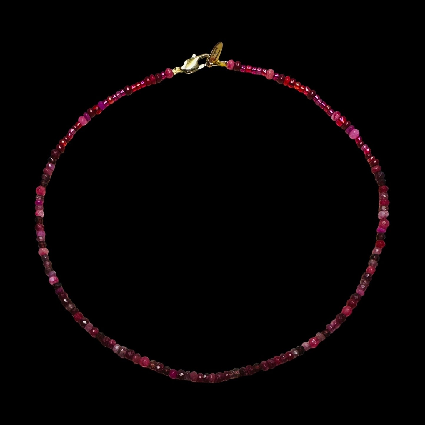  CLARKE PALMER - Ruby, Garnet, Tourmaline gemstone handmade necklace On background 