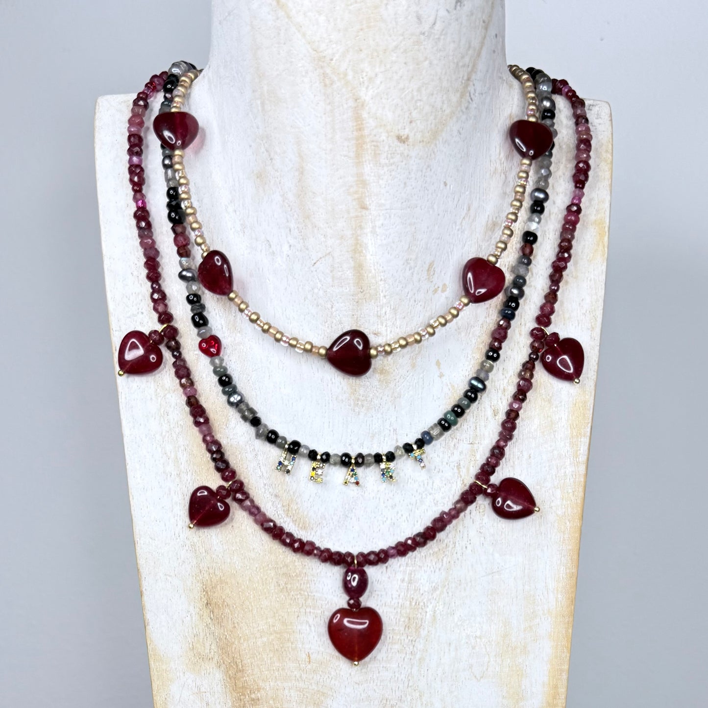 Chain of Hope ‘Wear Your Heart’ Courage Heart Necklace | Ruby, Garnet & Pink Tourmaline Necklace | Handmade Gemstone Jewellery | CLARKE PALMER