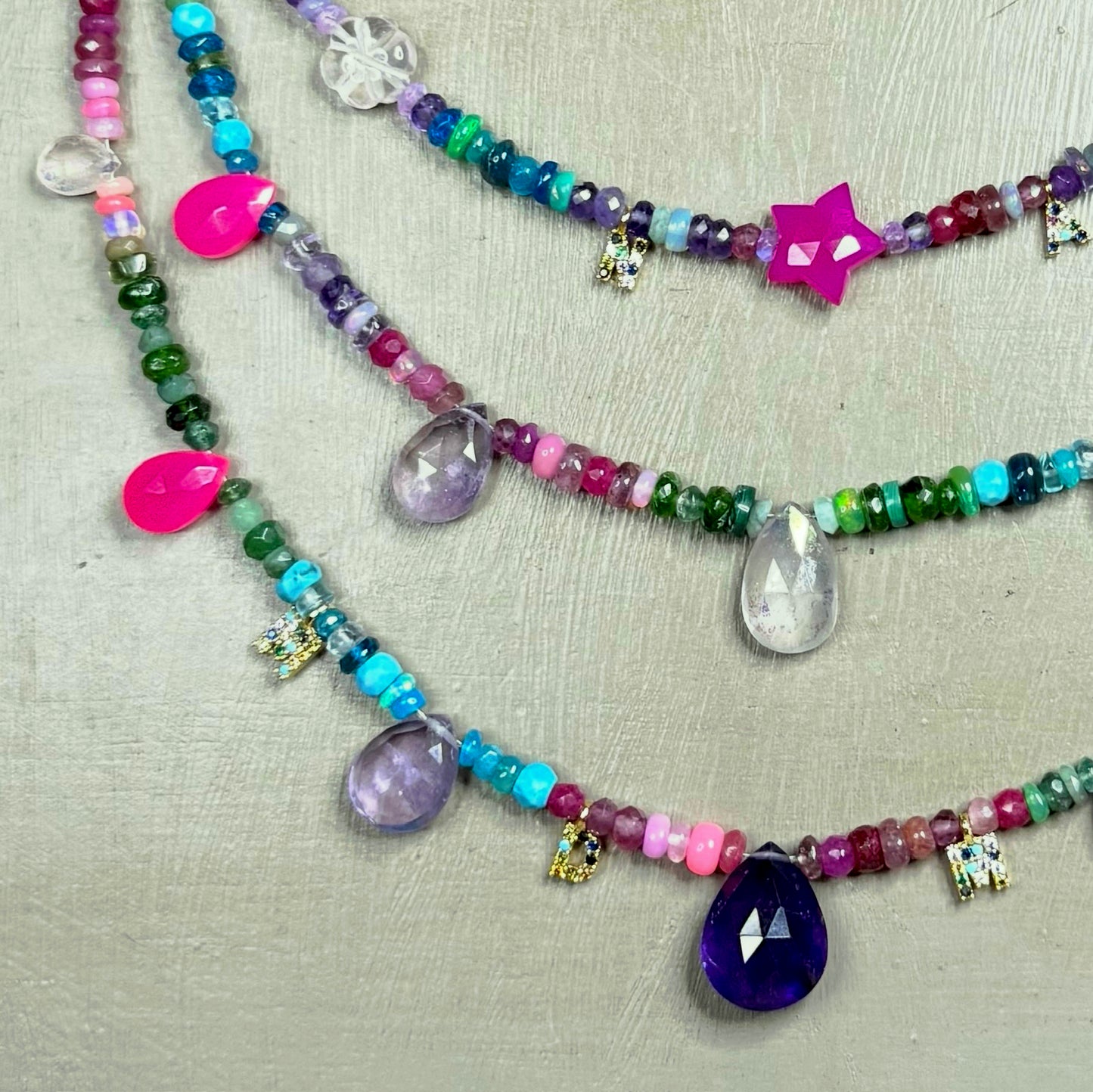 Personalised Three-Layer Gemstone Necklace with 22kt Gold Vermeil Letter Charms – Tropical Punk | CLARKE PALMER detail 