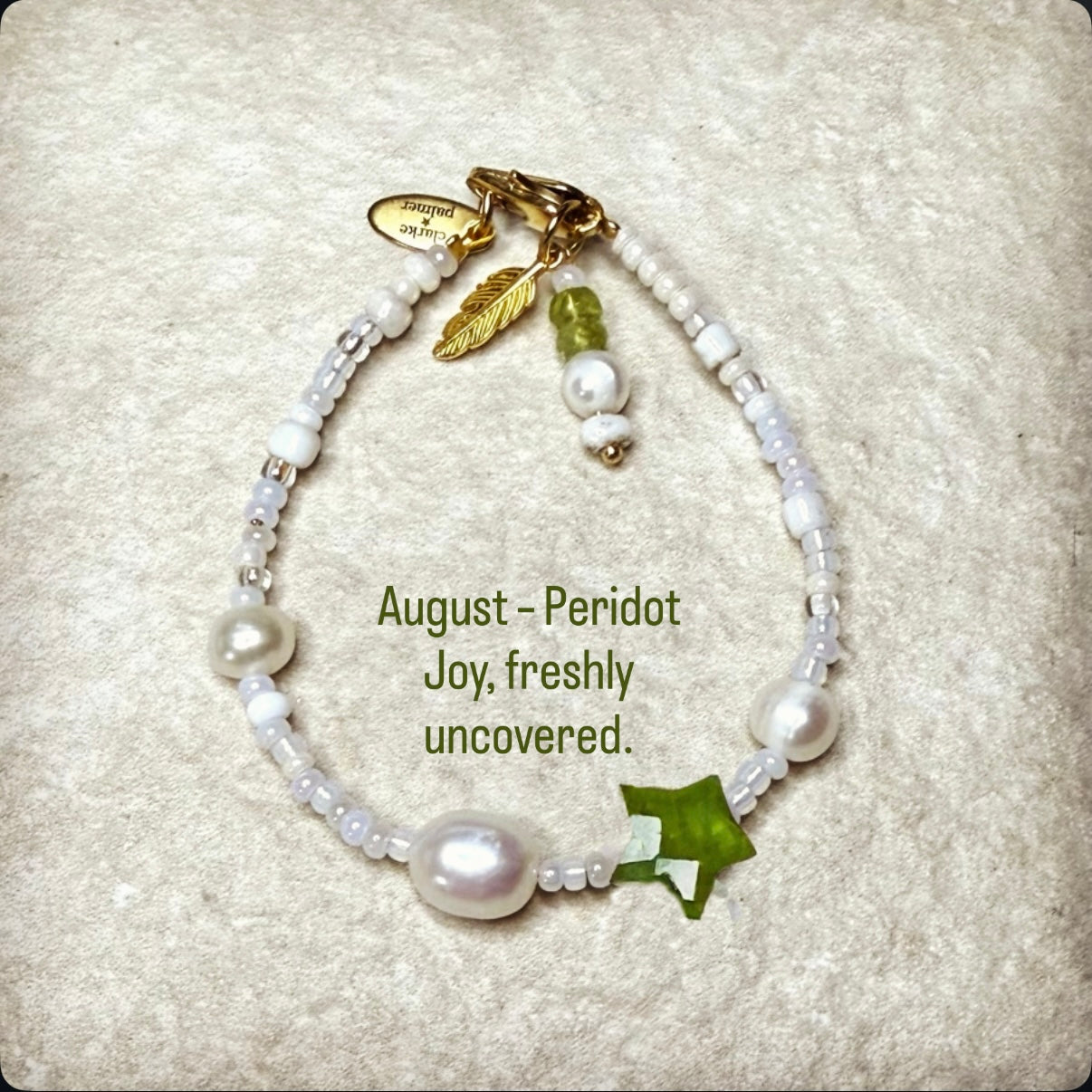 Pearl & Peridot Star Birthstone Bracelet with quote August – Peridot
Joy, freshly uncovered.