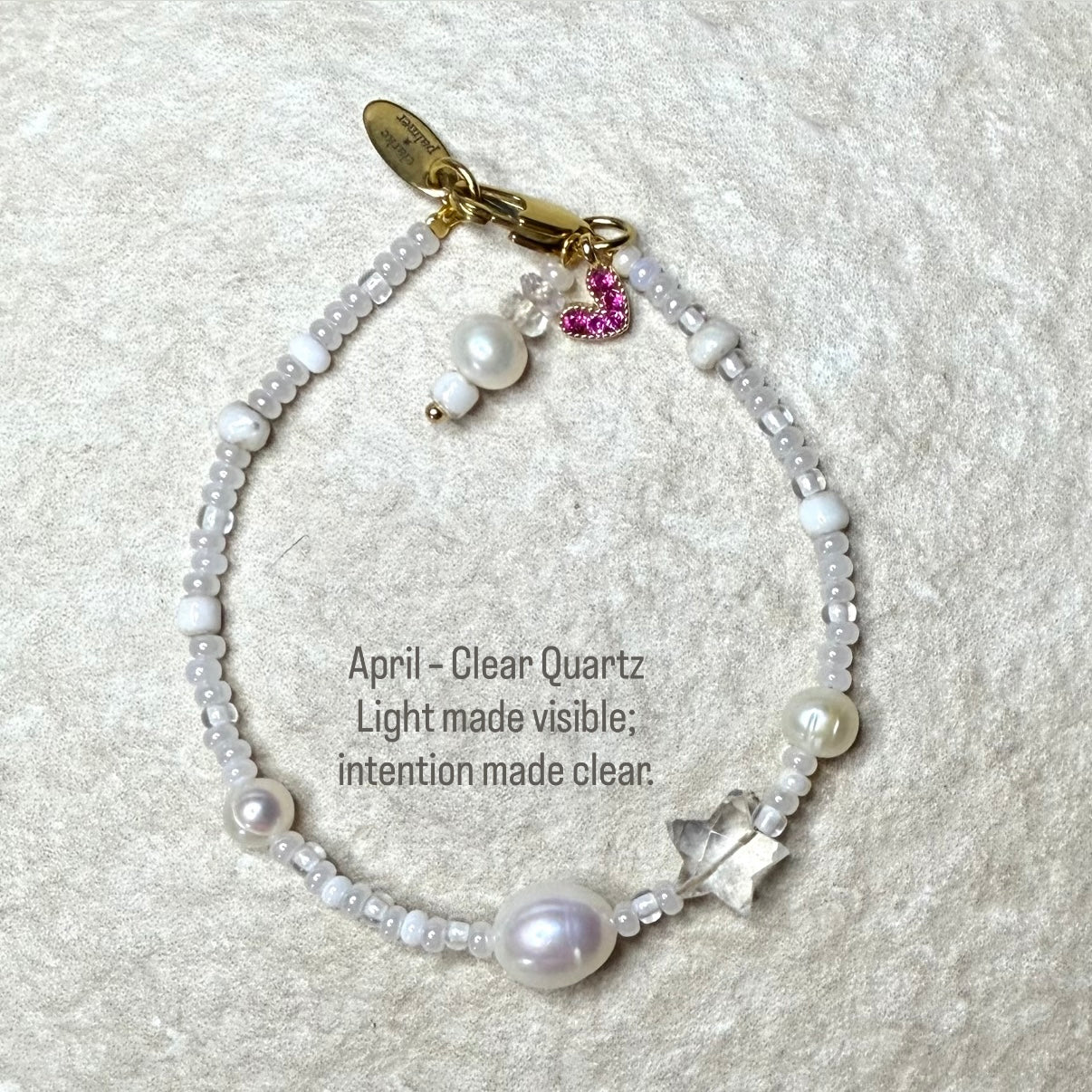 Pearl & Quartz Star Birthstone Bracelet  
with quote 
April – Clear Quartz
Light made visible; intention made clear.