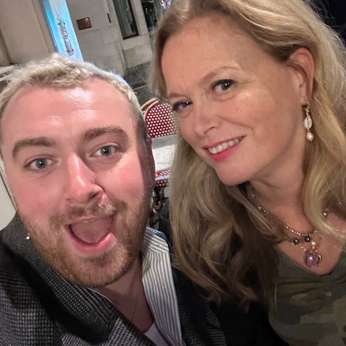 Sam Smith & Clarke Palmer Creative Director Jenny Palmer wearing Gold CZ cowrie shell earrings with pearl drops